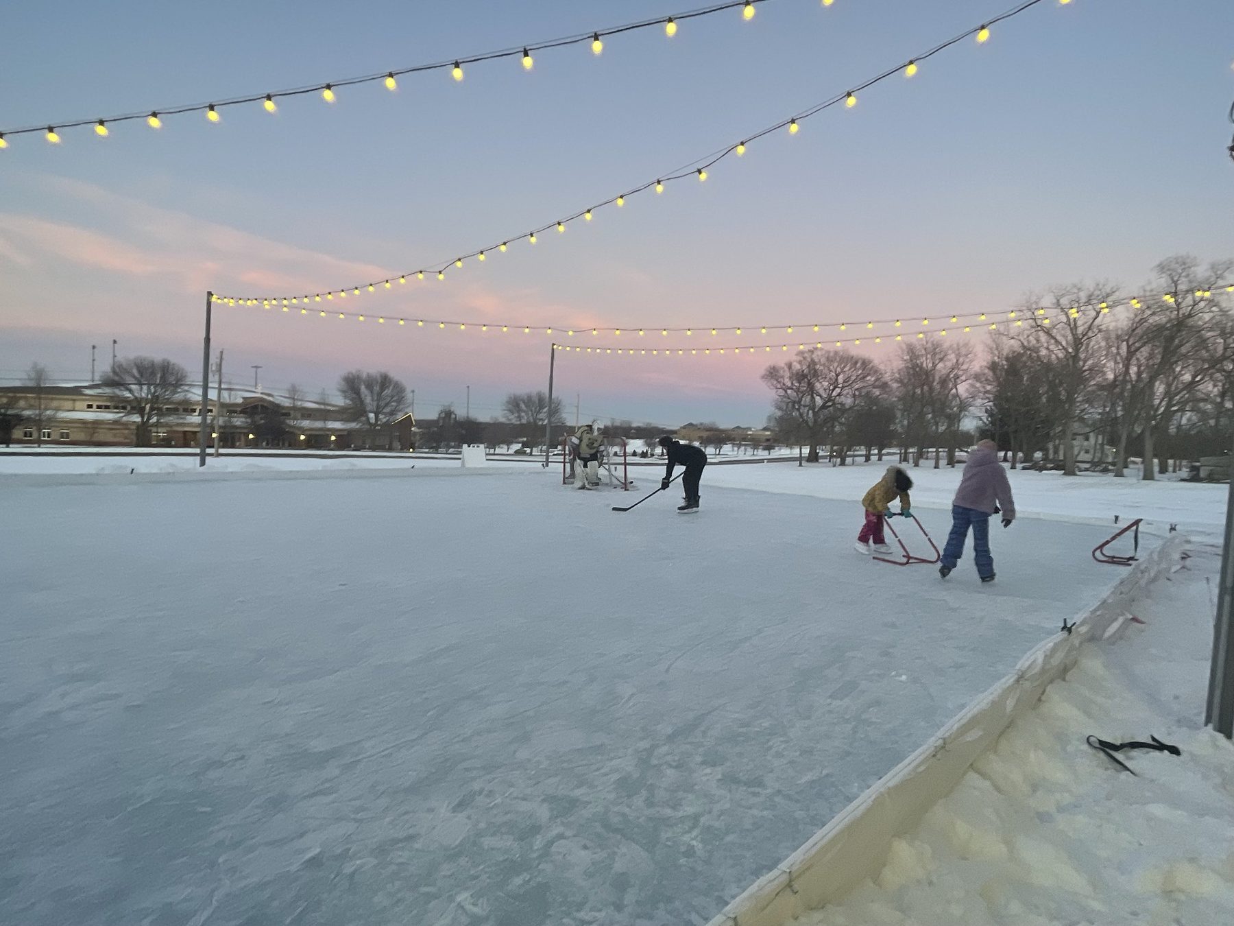 Skaters on the Valley Ice Plaza outdoor rink