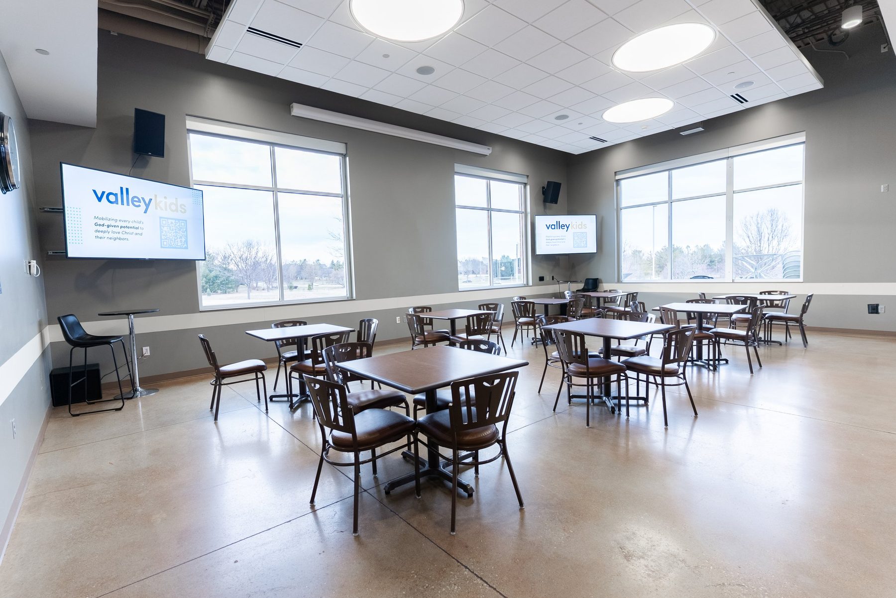 The Neighbor Room set with conference seating