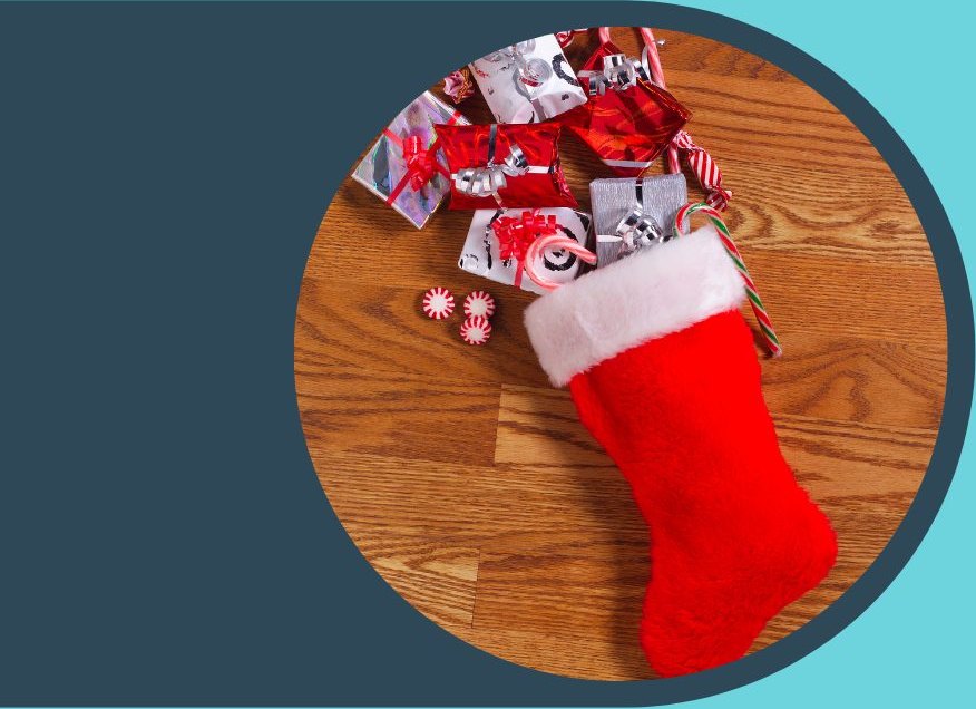 A Christmas stocking filled with wrapped gifts